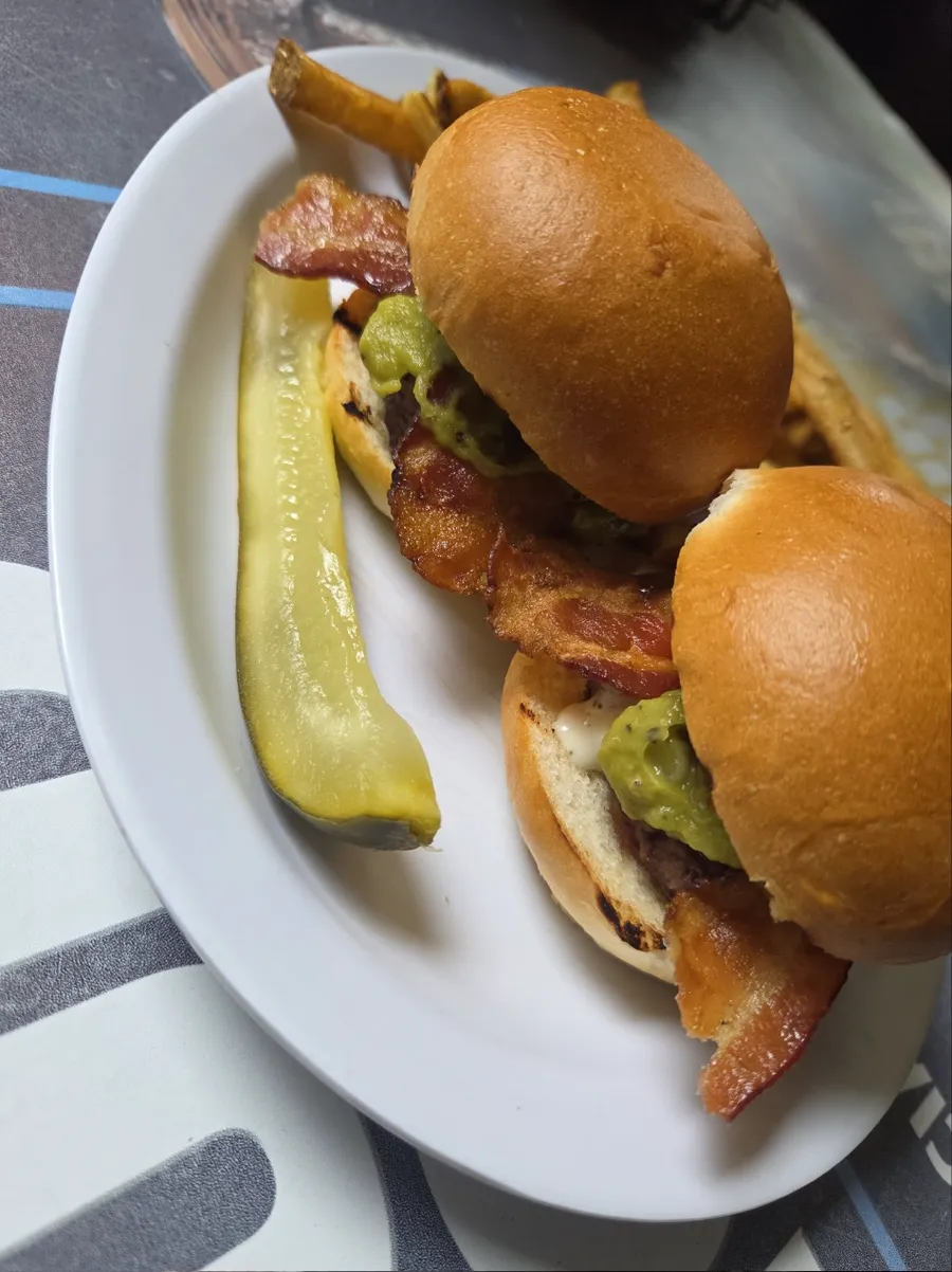Bacon, avocado and ranch sliders with a dill pickle spear